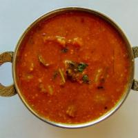 Sambhar · Mixture of vegetables and lentils flavoured with tamarind and finished with ghee.