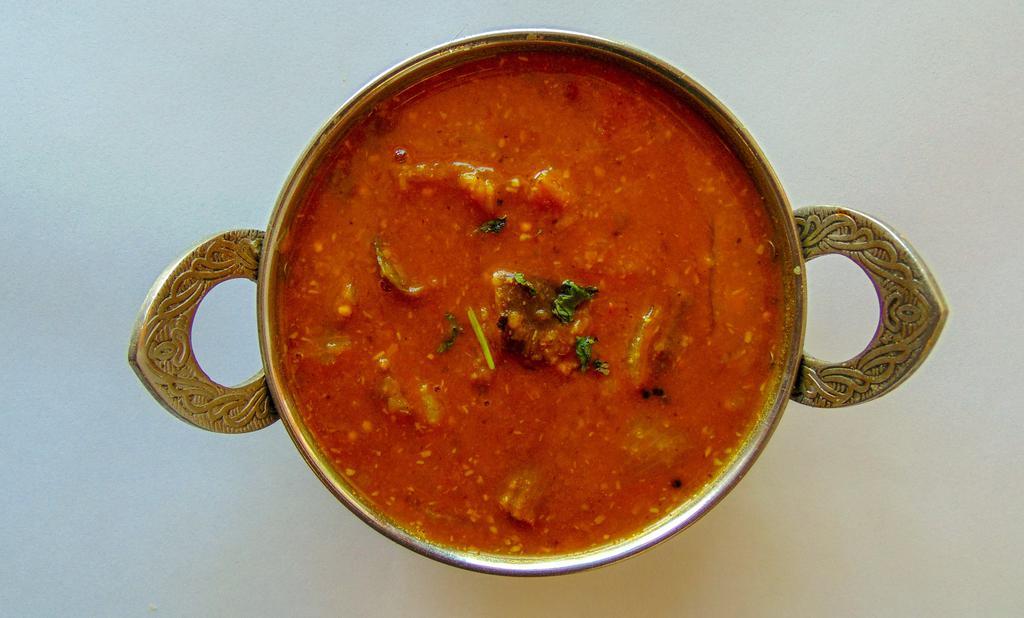 Sambhar · Mixture of vegetables and lentils flavoured with tamarind and finished with ghee.
