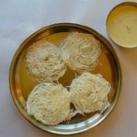 Idiyappam with Coconut Milk (4 Pc) · Steamed rice strings served with coconut milk.