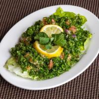 Tabbouleh Salad · Fresh finely chopped parsley, tomatoes, onions, lemon juice, olive oil, and bulgur wheat