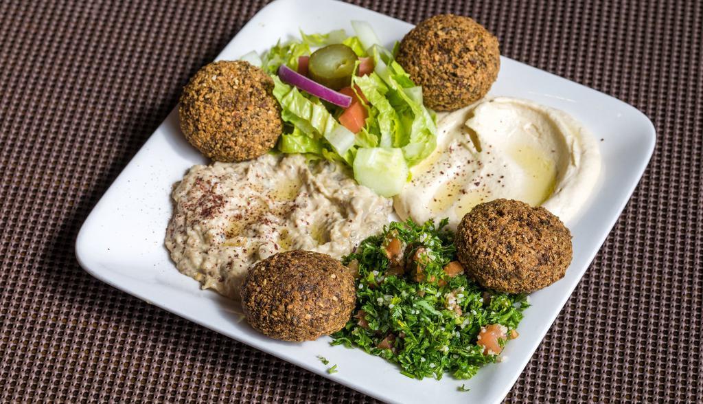 Veggie plate  · Hummus+baba ghanoush+falafel+bread+salad.