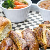 Chicken Plate · Popular. Power smoked boneless chicken thighs.
Served with two sides, (Honey Butter roll opt...