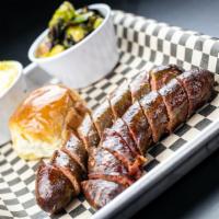 Link Plate · Popular. Come with two sides and 1/2 pound smoked homemade beef links.
Served with two sides...