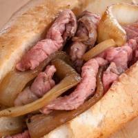 Tri Tip Buck Sandwich · Caramelized onions or Au Jus dipping sauce.