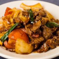 Tomato, Beef, & Tofu · A home-style dish with flank steak, tomato, tofu, onions, scallions, and oyster sauce.