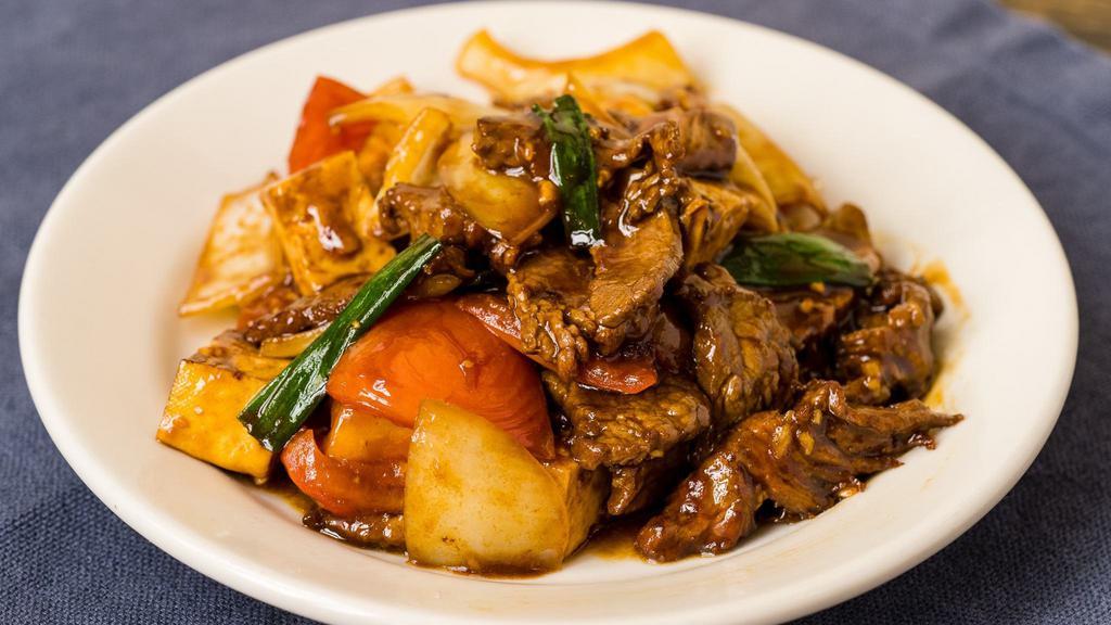 Tomato, Beef, & Tofu · A home-style dish with flank steak, tomato, tofu, onions, scallions, and oyster sauce.