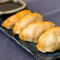 Pot Stickers
 · Pan-sautéed dumplings filled with pork, cabbage, scallions, and ginger. Served with housemad...