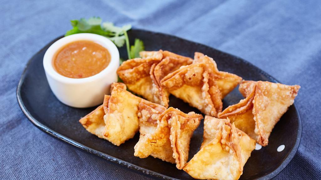 Crab Wontons
 · Fresh dungeness crab, cream cheese, and scallions, fried crispy, and served with a plum dipping sauce.