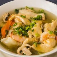Won Ton Noodle Soup
 · Wonton served with prawns, chicken, mushrooms, carrots, spinach, scallions, and noodles in c...