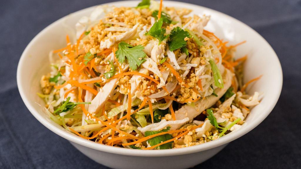 Chinese Chicken Salad
 · Roasted chicken, lettuce, carrots, cilantro, scallions, and rice sticks with peanuts and sesame seeds. Served with a side of lemon-soy vinaigrette.