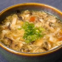 Hot & Sour Soup
 · Bamboo shoots, tofu, wood ears, tomato, mushrooms, lily buds, egg flower in chicken broth an...