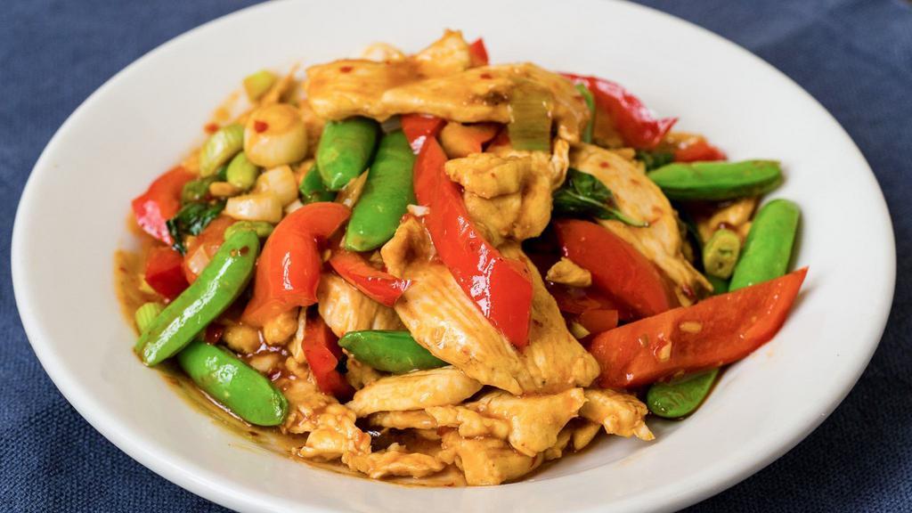 Lemongrass Chicken · A spicy dish with sugar snap peas, red bell pepper, lemongrass, basil, scallions, and chili sauce.