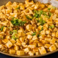 Ma Po Tofu · Vegetarian. A spicy home-style dish of silken tofu and ground pork braised in a spicy brown ...
