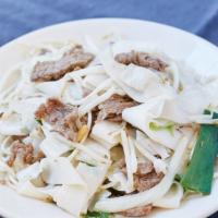 Chow Fun Noodles · Gluten-free. Ribbons of rice noodles stir-fried with bean sprouts, onions, scallions, and yo...