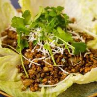 Minced Chicken in Lettuce Cups · Gluten-free. A stir-fry with basil, fresh chilies, onions, scallions, ginger, and garlic ser...