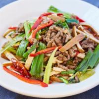 Dragon Beef · Gluten-free. A lightly spicy stir-fry with scallions, Chinese, and yellow chives, red chilie...