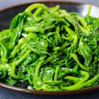 Stir-Fried Pea Shoots · Gluten-free. Tender, leafy pea shoot tips seasoned with garlic.