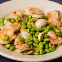 Crystal Prawns · Gluten-free. Delicately stir-fried with soy beans, mushrooms, scallions, ginger, and garlic.