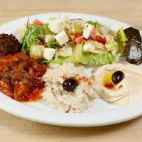 Veggie Combo Plate · Vegetarian. Sautéed eggplant, baba ghanoush, hummus, dolma, Greek salad & falafel.