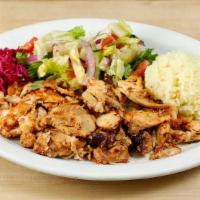 Chicken Gyro Plate plate · Slow cooked, thinly sliced, marinated chicken.