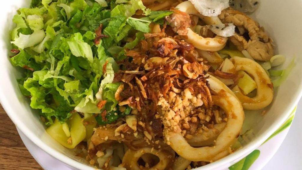14. Flat Yellow Egg Noodle - Mi Quang · With pork, shrimp, and squid.