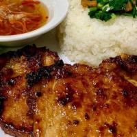 72. Grilled Porkchop-Suon nuong · Over rice.
