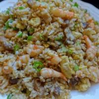 69. Combination Fried Rice - Com chien thap cam · With chicken, shrimp, and squid.