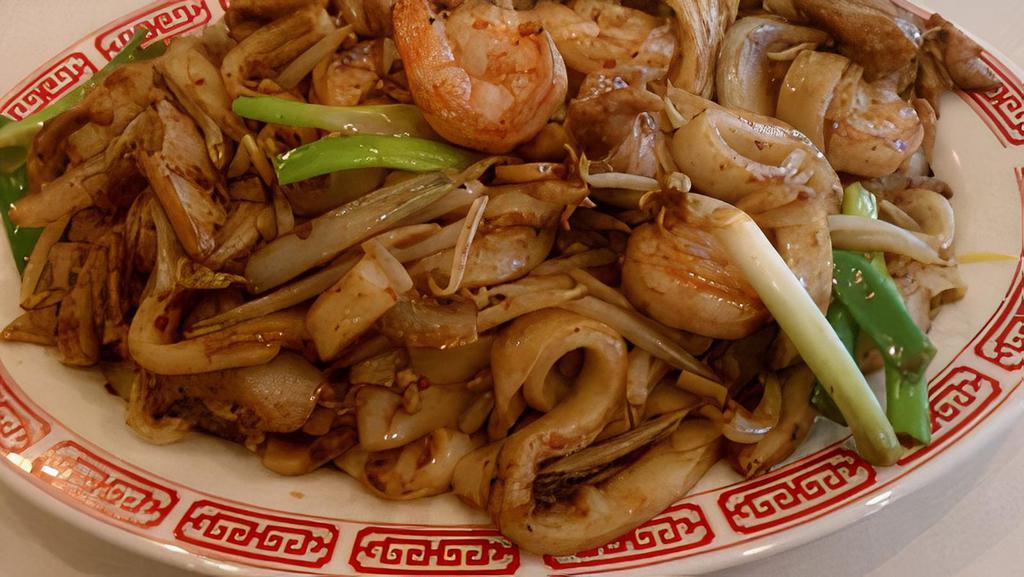 60. Seafood Chowfun - Hu tieu xao hai san · With shrimp, squid, and fishball.