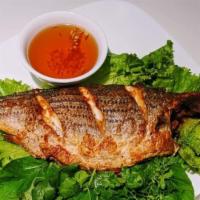 105. Fried Pompano Fish- Ca pompano chien voi mam gung · With ginger fish sauce & steamed rice.