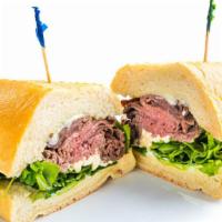 Baby Blue · Roast beef, blue cheese crumbles & spinach w/ mayo & Dijon mustard.