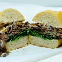 The Black and Blue · Tri Tip w/ Blue Cheese Crumbles, Blue Cheese dressing, Mayo, Herbed Olive Oil, Spinach, Toma...