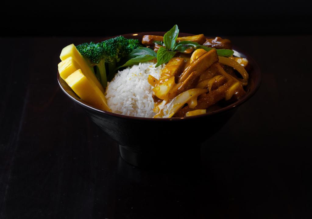 Mango Bowls · Marinated and tossed in a wok with soy sauce, white pepper, basil, onions, sambal chili and mango puree.