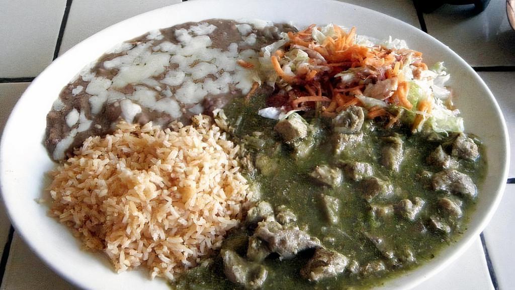 Chile Verde · Chunks of pork simmered in a green tomatillo and cilantro sauce.