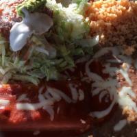 1. Combination Plate · Red sauce chicken enchilada, ground beef taco, and chile relleno.