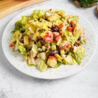 Greek Salad · Chopped romaine, cucumber, tomato, kalamata olives, bell pepper, and imported sheep’s feta c...