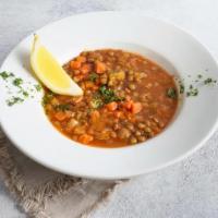 Ema's Lentil Soup · Our new homemade warm and hearty green lentil soup simmered with carrots, onion, celery, and...
