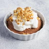 Chocolate Mousse · Bittersweet chocolate with handmade whipped cream and chopped walnuts (gf )