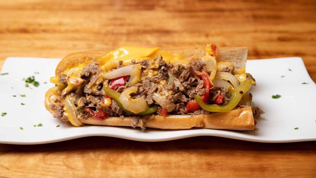 Philly Cheese · Sirloin steak, American cheese, grilled onions & peppers.
