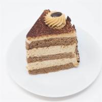 Cappuccino Cream Cake Slice · A Slice of Mocha-Chocolate Cake with a Blend of Mascarpone, Whipped Cream, and Coffee.