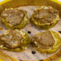 23. Steamed Beef Siu Mai 牛肉燒賣 · 4 pieces.