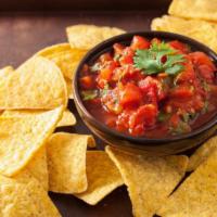 Chips and Salsa · Bag of tortilla chips and housemade salsa.