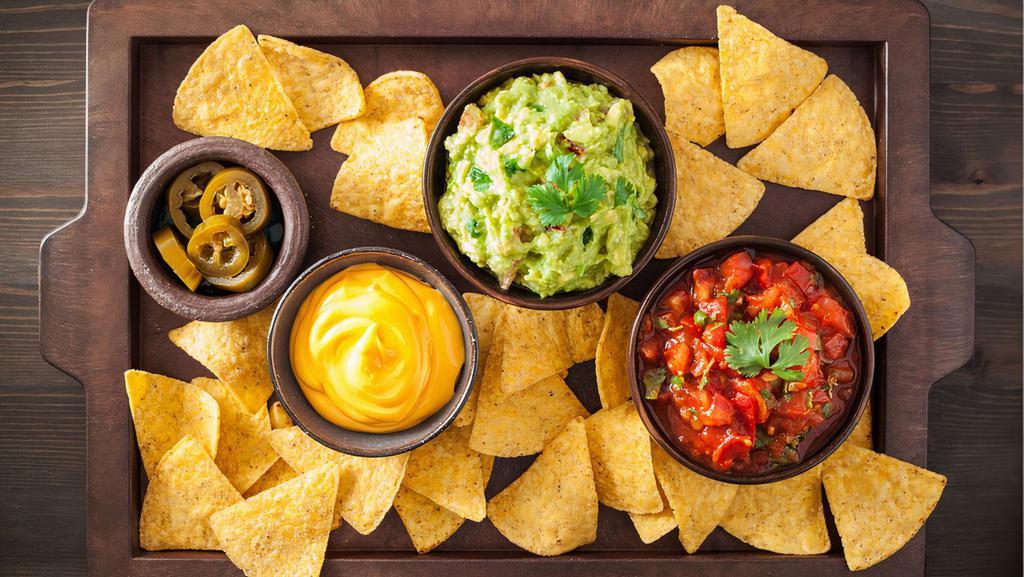 Side of Cheese Sauce, Salsa or Guacamole · Side of cheese sauce, salsa or guacamole.