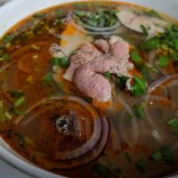 Vegetarian Bun Bo Hue · Mushrooms, pineapple, tofu, spicy vegetable broth, thick vermicelli noodle. Garnishes of cab...
