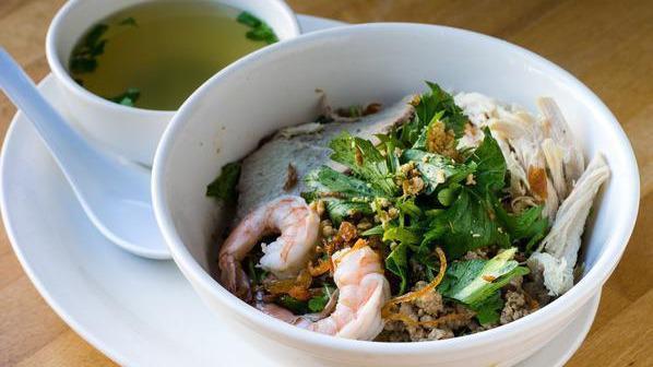 Hu Tieu Kho · Xa-xiu and ground pork, chicken, shrimp. Rice noodles, and soy-tomato sauce.