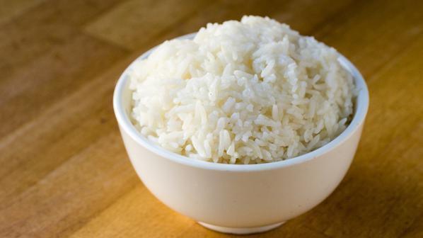 Side Rice · Jasmine or brown steamed rice.