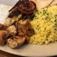 Chicken Souvlaki Platter · Skewered charbroiled chicken breast, rice, grilled vegetables, tzatziki, pita.