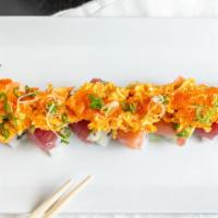 Titanic · Shrimp tempura & cucumber wrapped with tuna and salmon, topped with spicy crab meat, tobiko,...
