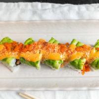 Lambada Roll · Tuna, salmon wrapped with avocado topped with tobiko and spicy sauce.