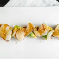 Love Roll · Deep fried shrimp and spicy crab topped with scallop, avocado and sauce.