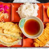 Deluxe Bento · Chicken teriyaki, 3 pieces of sushi, 3 pieces of california roll, tempura & shumai.